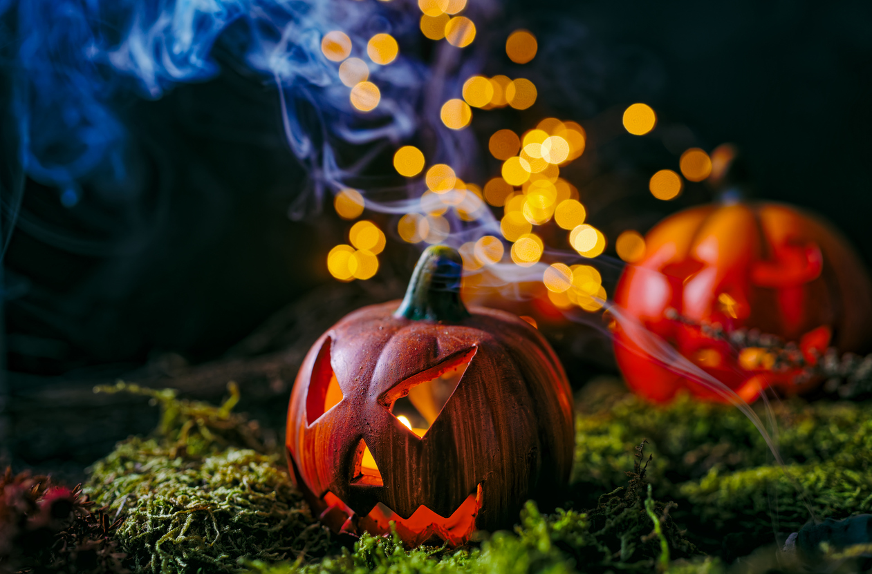 Two Jack-o'-Lanterns with smoke and fairy lights